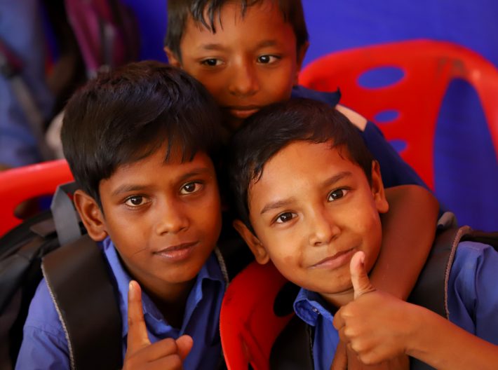 happy children giving the thumbs up